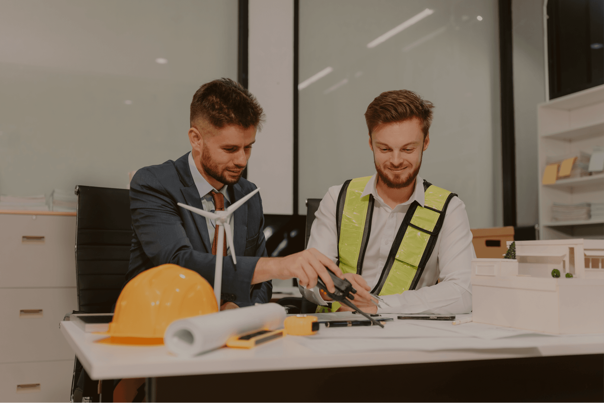 mechanical-estimator-reviewing-several-hvac-and-piping-bid-packages